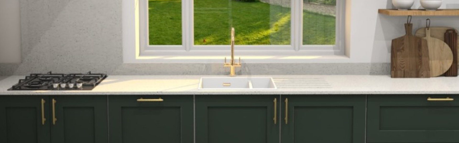 Fitted Kitchen Worktop Dark green fitted kitchen units with light worktop beneath a rear window