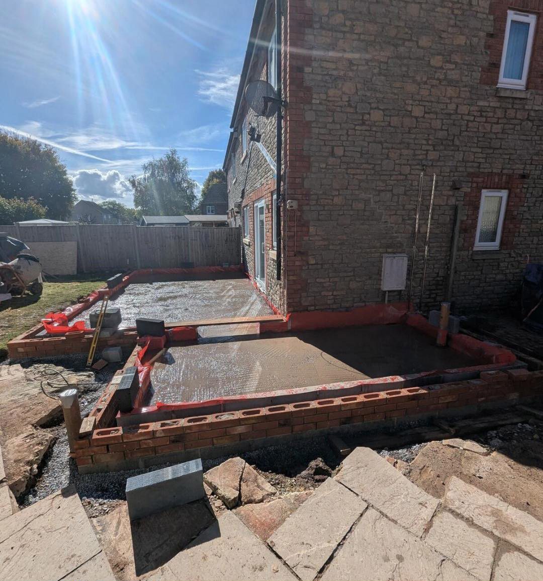 Groundworks and new brick base taking shape for a house extension