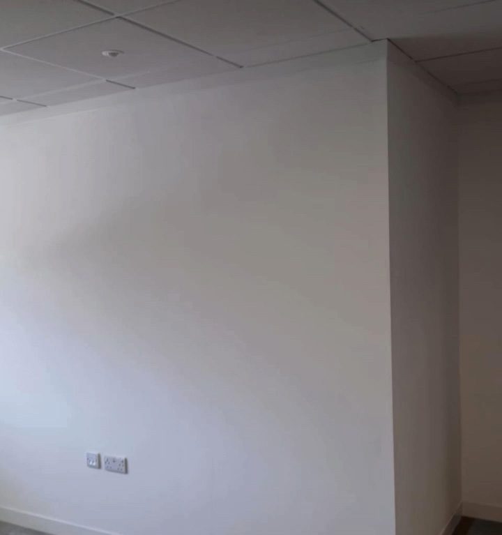 Freshly finished white office wall during a commercial refurbishment in Bridgwater